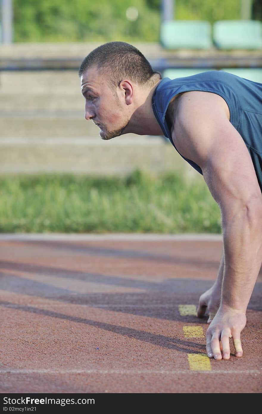 Young athlete on start