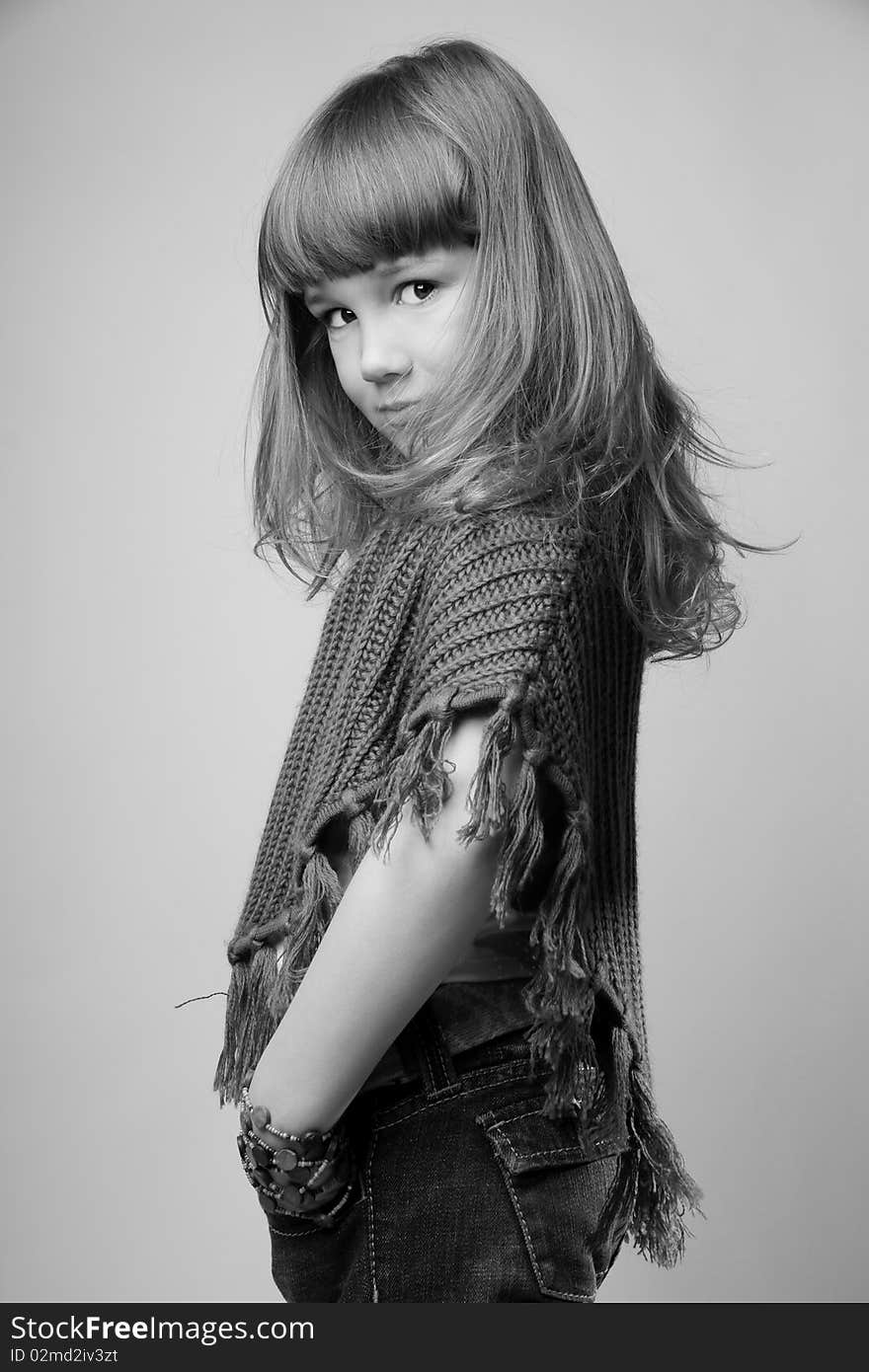 Beautiful smiling girl in studio, black&white shot. Beautiful smiling girl in studio, black&white shot