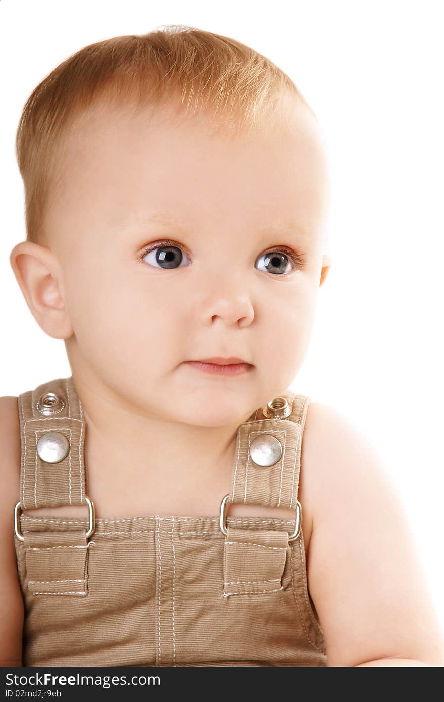 Little pretty smiling baby-boy with grey eyes, isolated on white background