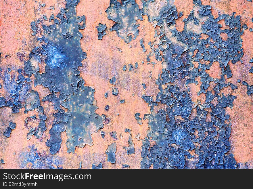 The old metal plate covered with paint and rust-eaten. The old metal plate covered with paint and rust-eaten