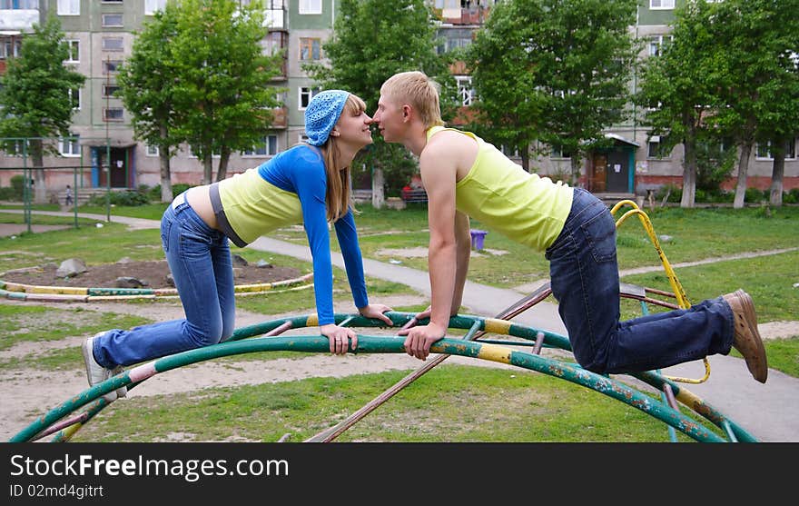 Young man and the woman together outside. Young man and the woman together outside