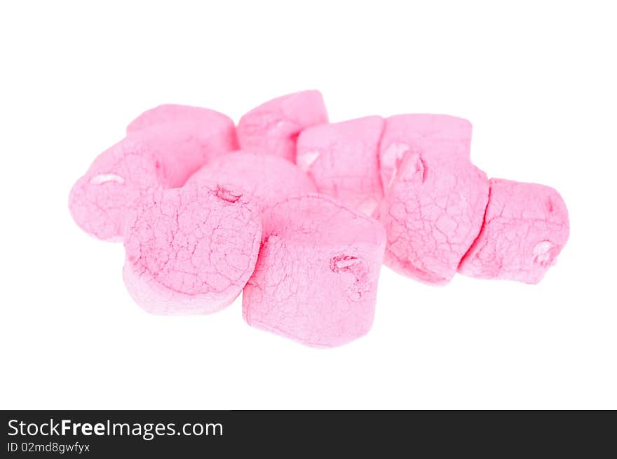 A group of pink fluffy marshmallows over white