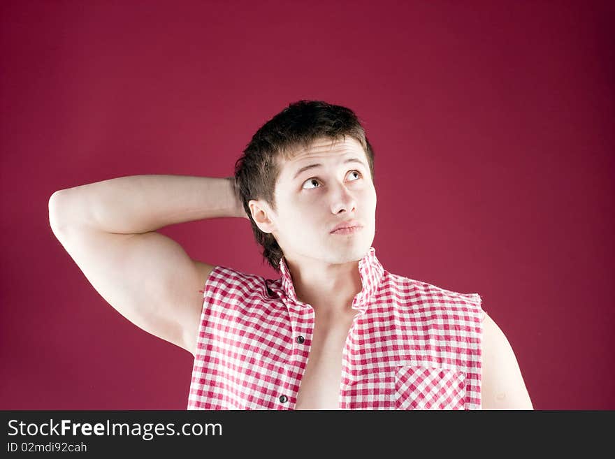 Young Casual Man Portrait, Isolated On Red