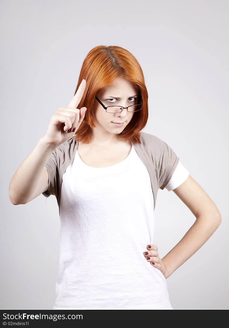 Young businesswomen in white with glasses.