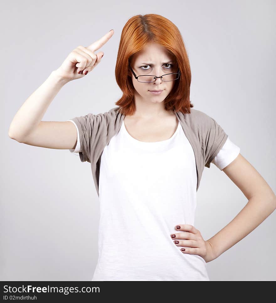 Young businesswomen in white with glasses.