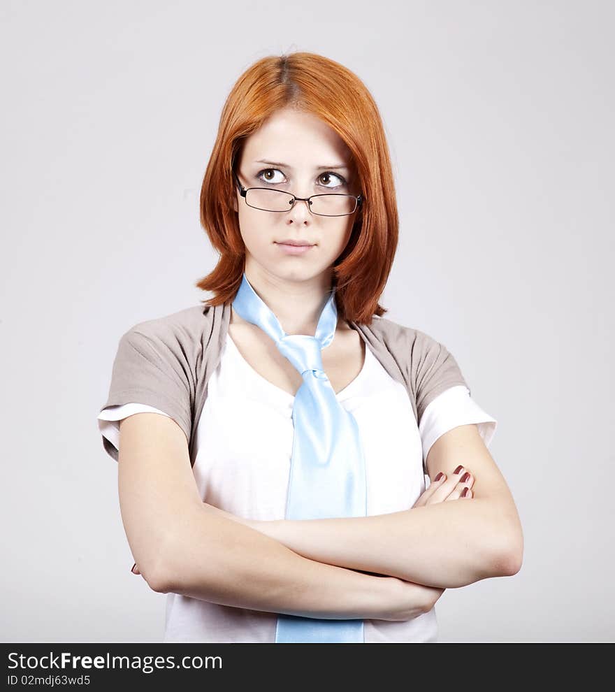 Young Businesswomen in white with tie and glasses