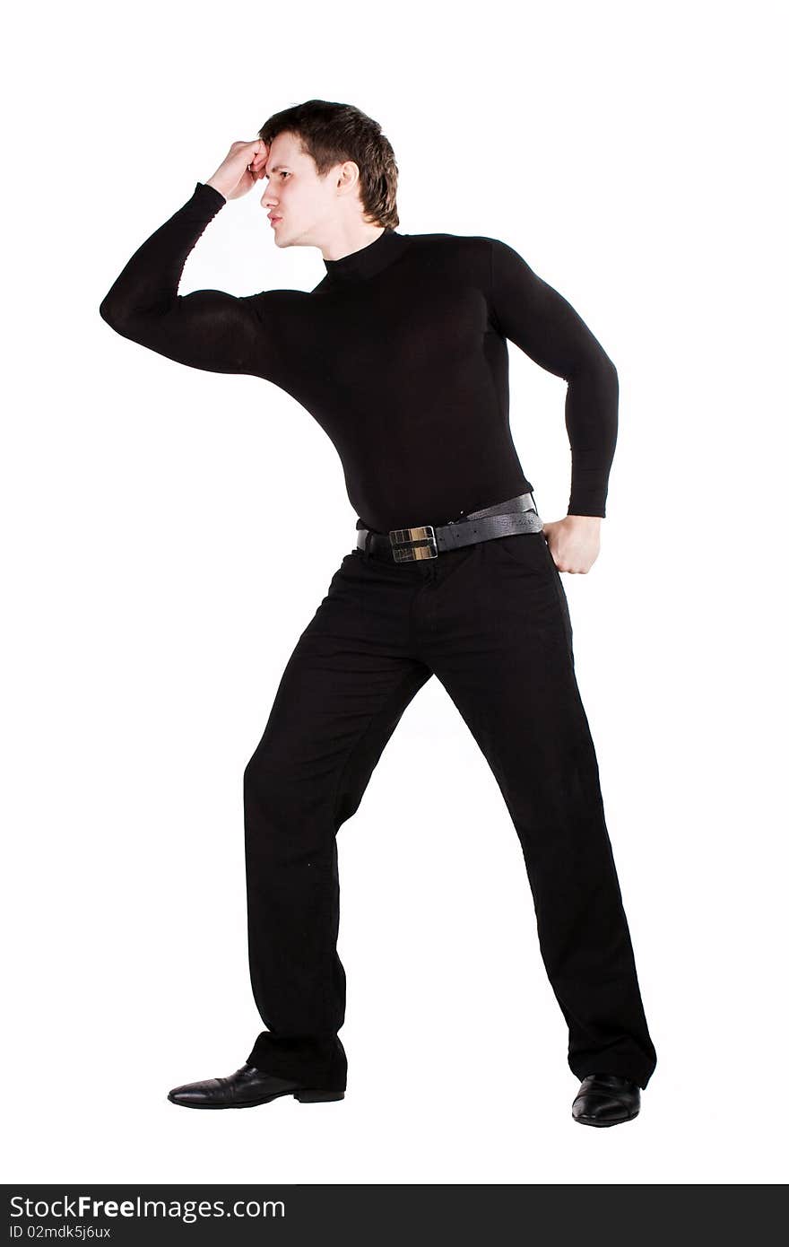 Confident guy dressed in black on a white background. Confident guy dressed in black on a white background