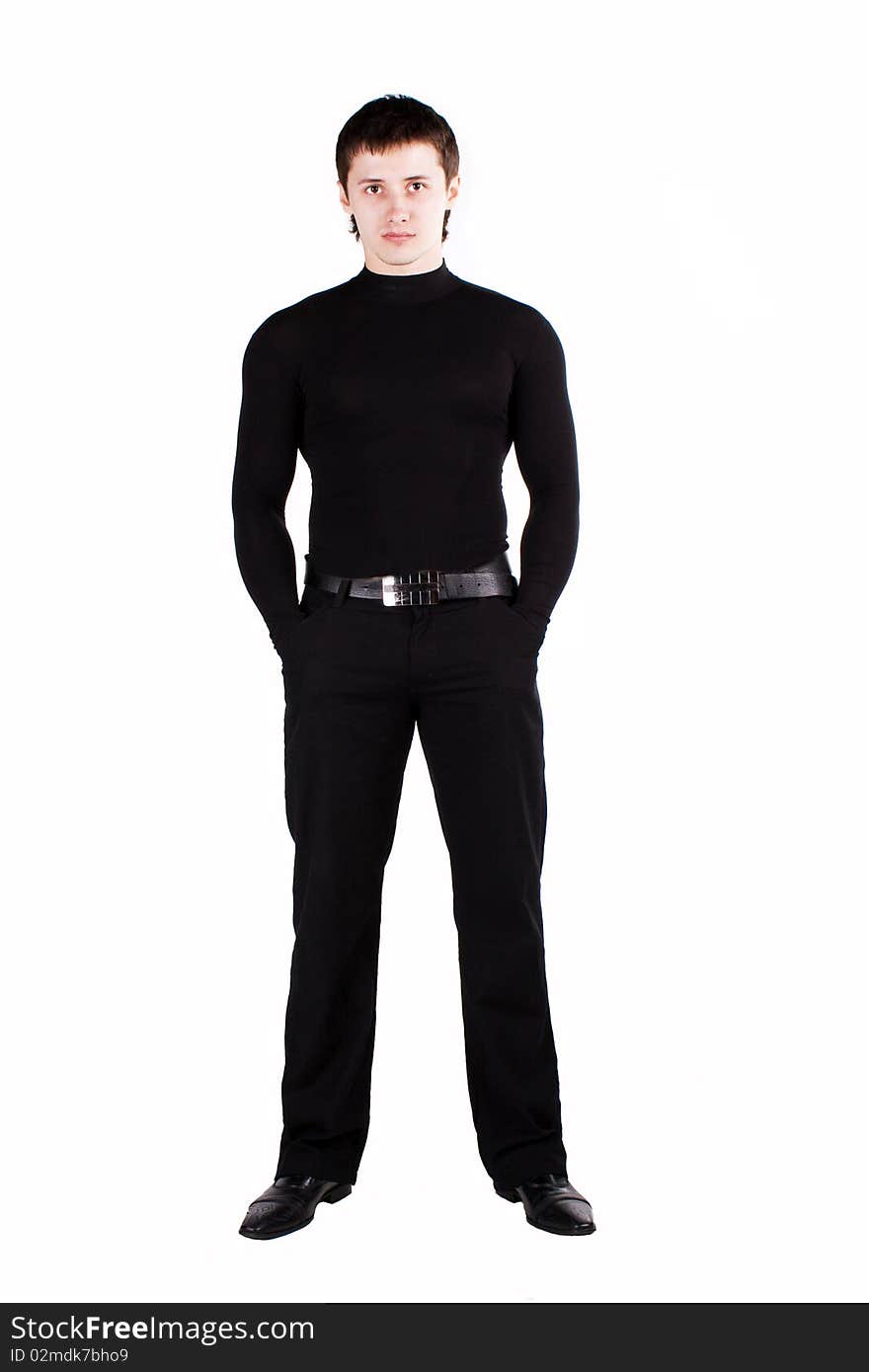 Confident guy dressed in black on a white