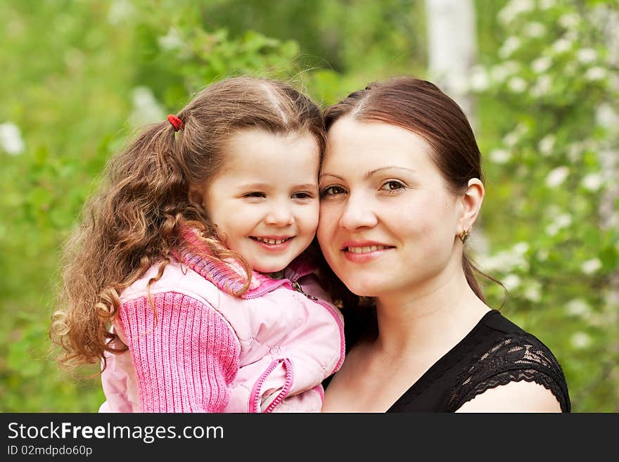 Mother and the daughter on nature. Mother and the daughter on nature