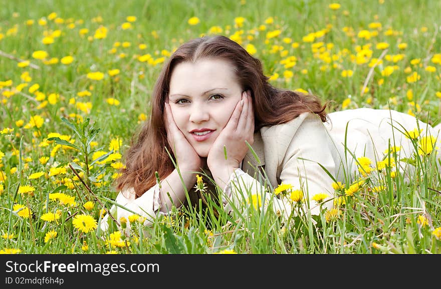 The young woman on the nature