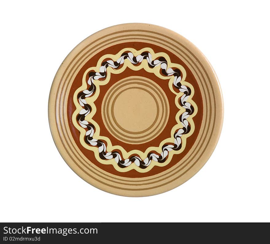 Dish with a decorative pattern on a white background. Dish with a decorative pattern on a white background