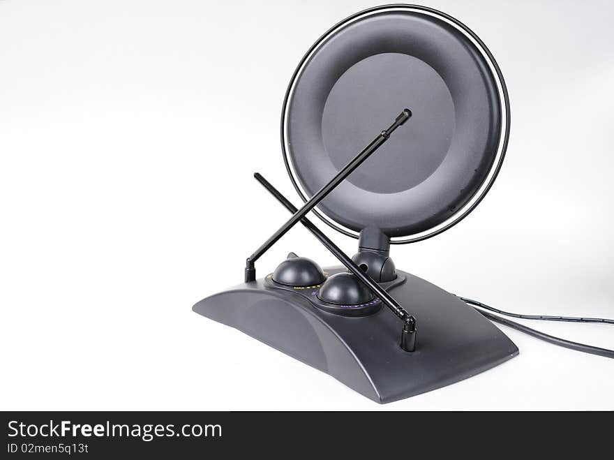 A television antenna with dish on white background. A television antenna with dish on white background.