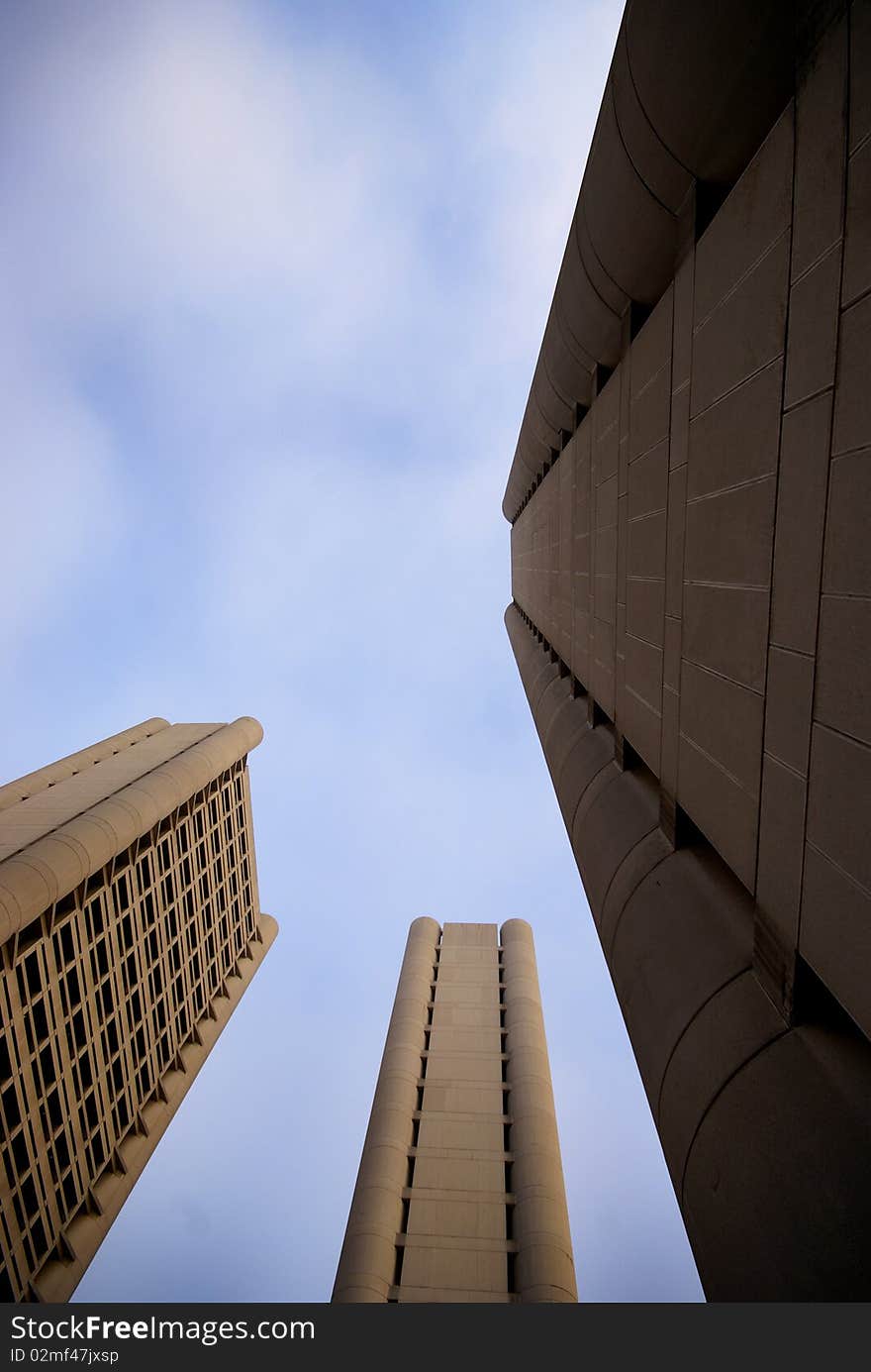 Three modern sky-scrapers aimed at the sky at sunset. Three modern sky-scrapers aimed at the sky at sunset