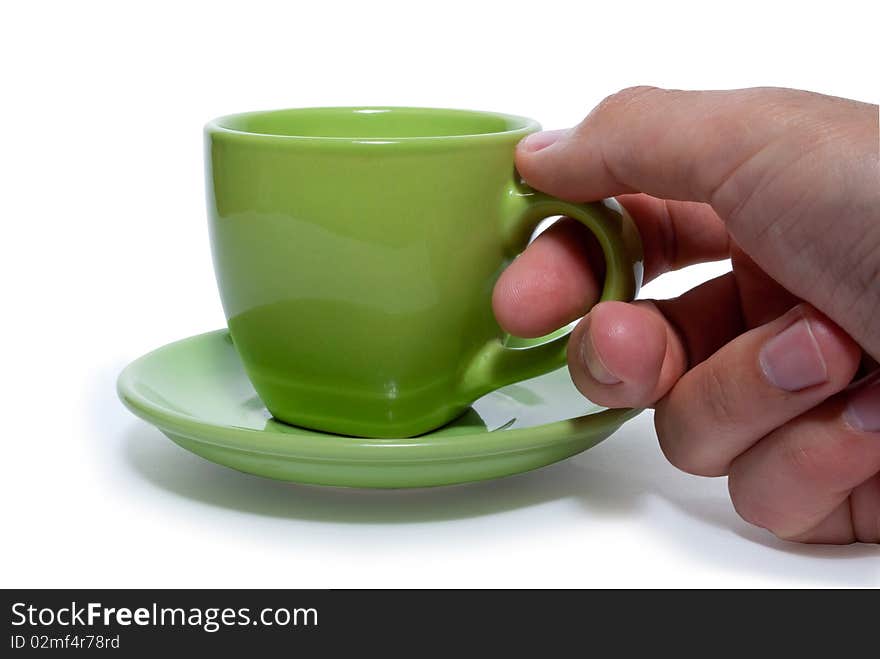 A cup of green on a white background. Isolated.