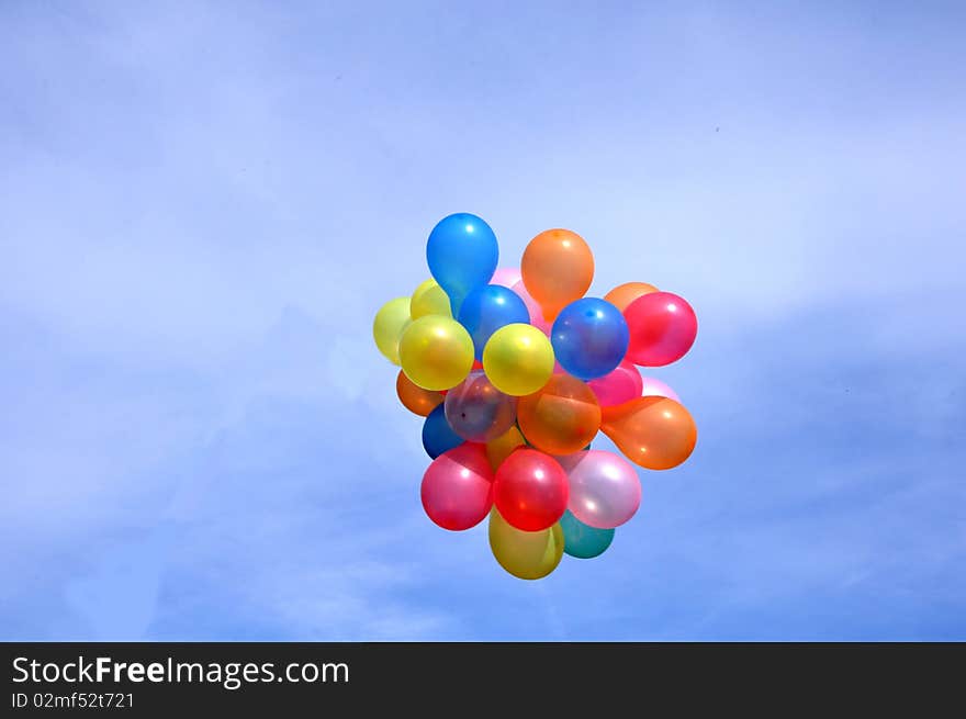 Groups of colored balloons fly to heaven. Groups of colored balloons fly to heaven