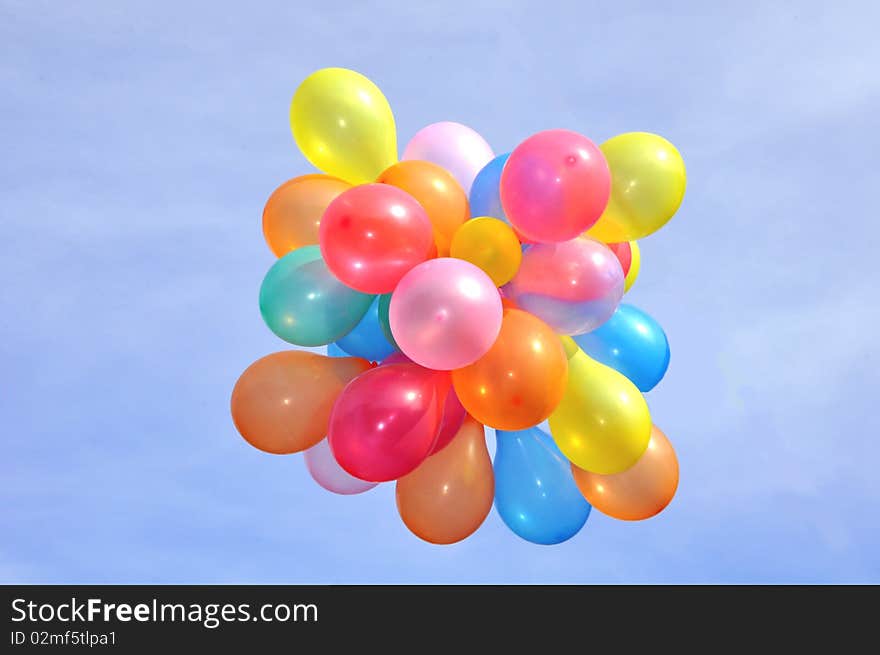 Groups of colored balloons fly to heaven. Groups of colored balloons fly to heaven