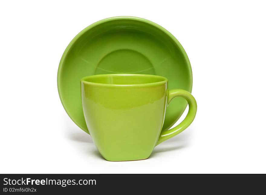 A cup of green on a white background. Isolated.