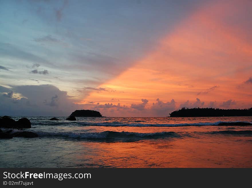 Sunset over the Indian Ocean off the island of Phuket in Thailand. Sunset over the Indian Ocean off the island of Phuket in Thailand