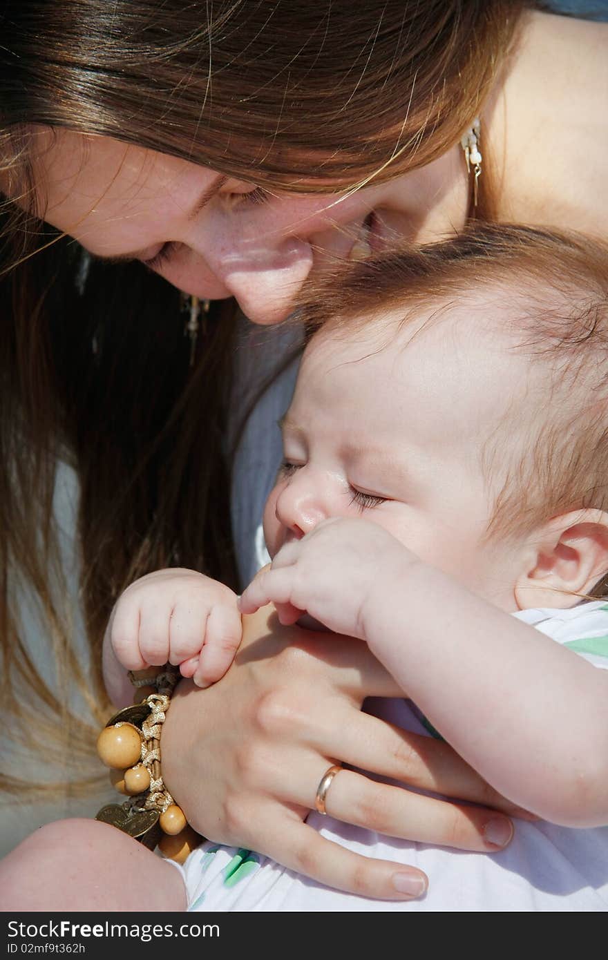 Close up portrait of mother and baby