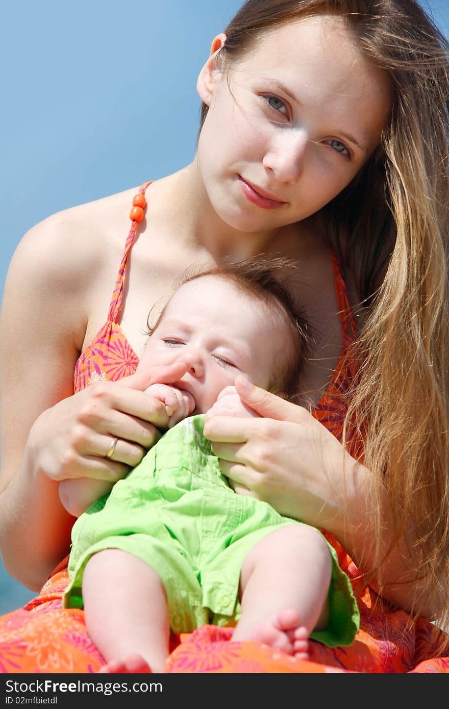 Mother And Baby Over Blue