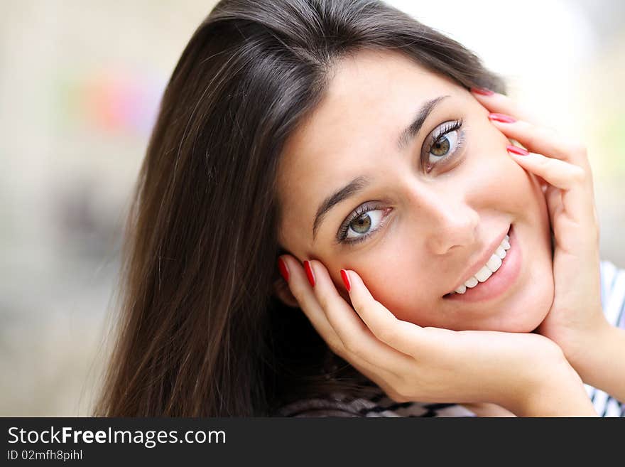 Portrait of young happy smiling woman