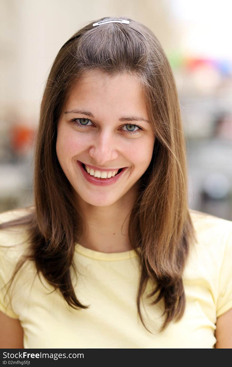 Portrait of young happy smiling woman