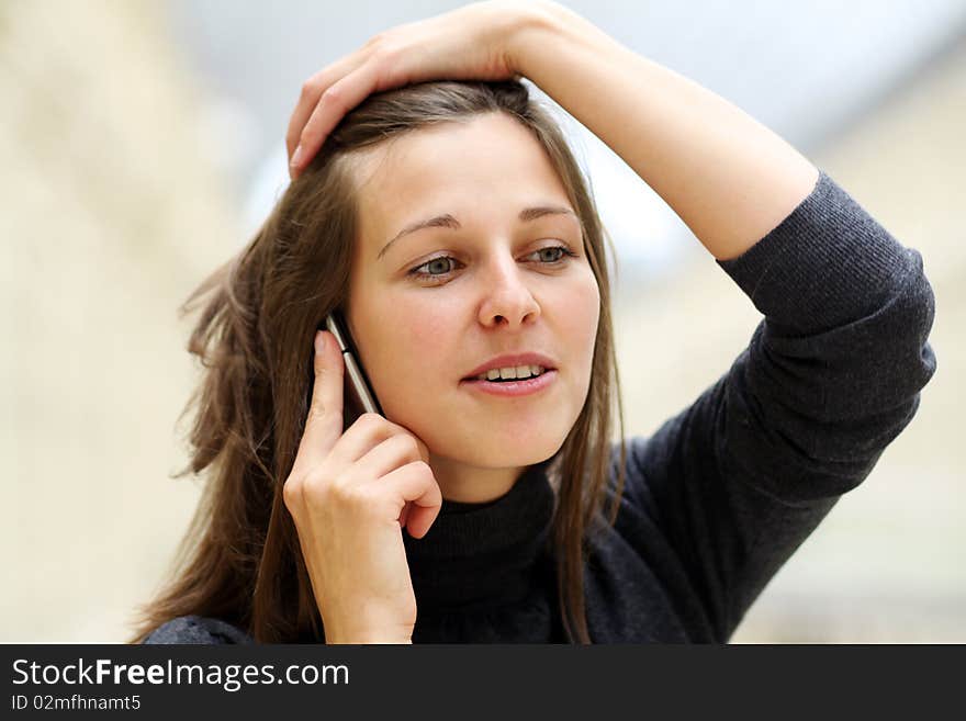 Closeup woman with mobile telephone