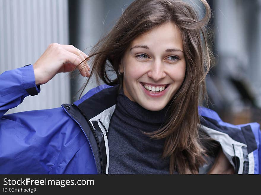 Closeup - happy young woman smiling