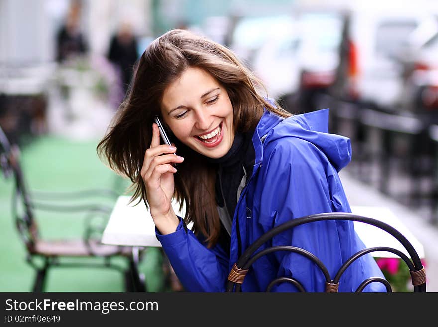 Woman with mobile telephone