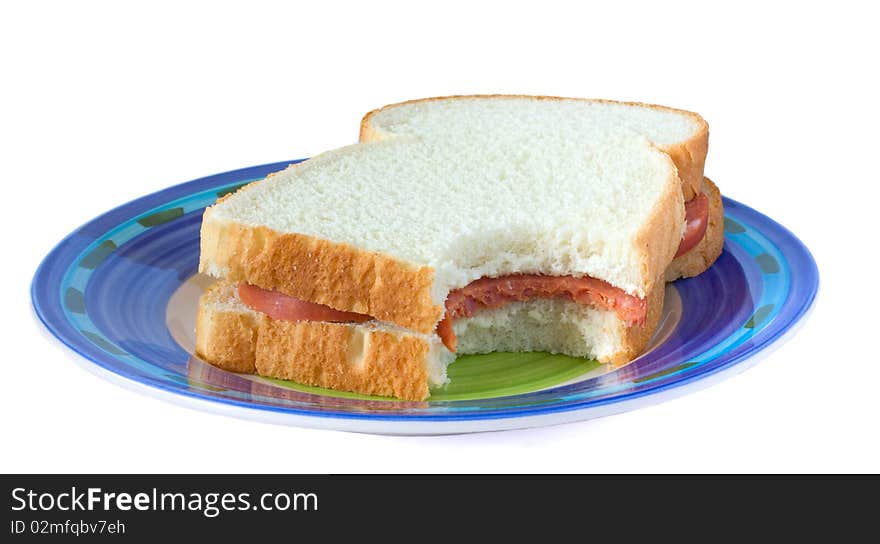 sandwich with sausage on a plate