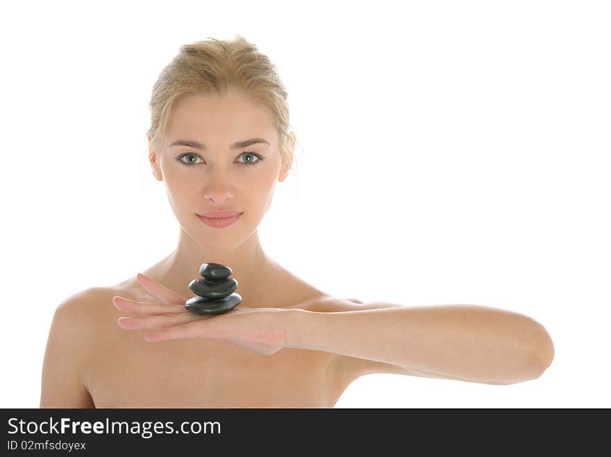 Beautiful young woman holds stones