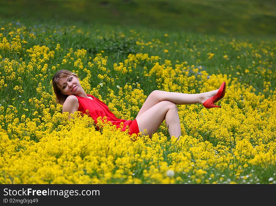 The girl in a blossoming field