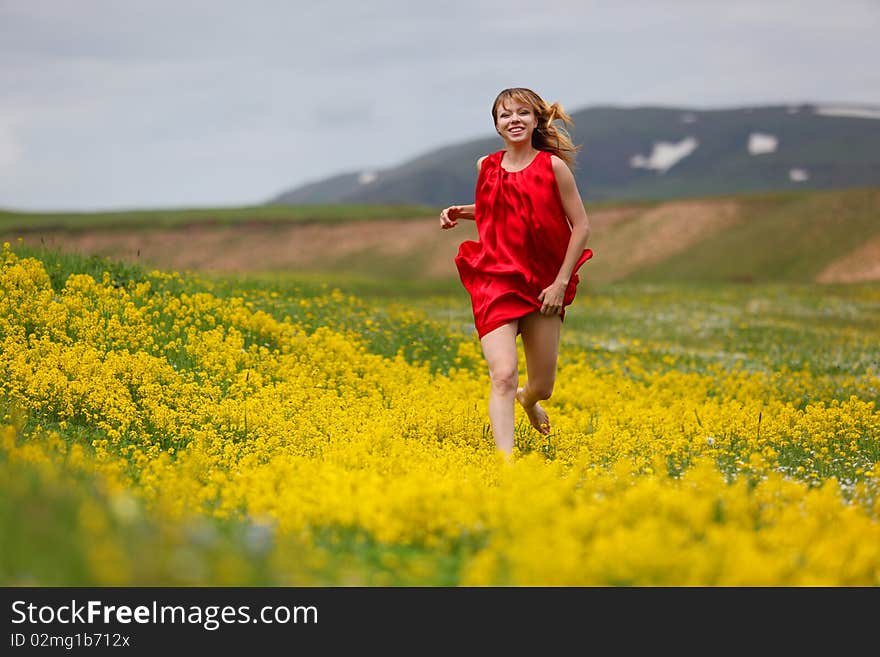 The girl in a blossoming field