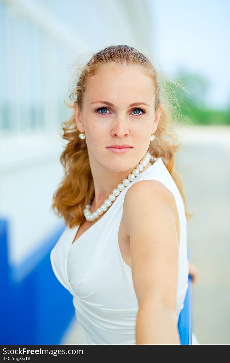 Woman  fashion portrait in outdoors with natural expression