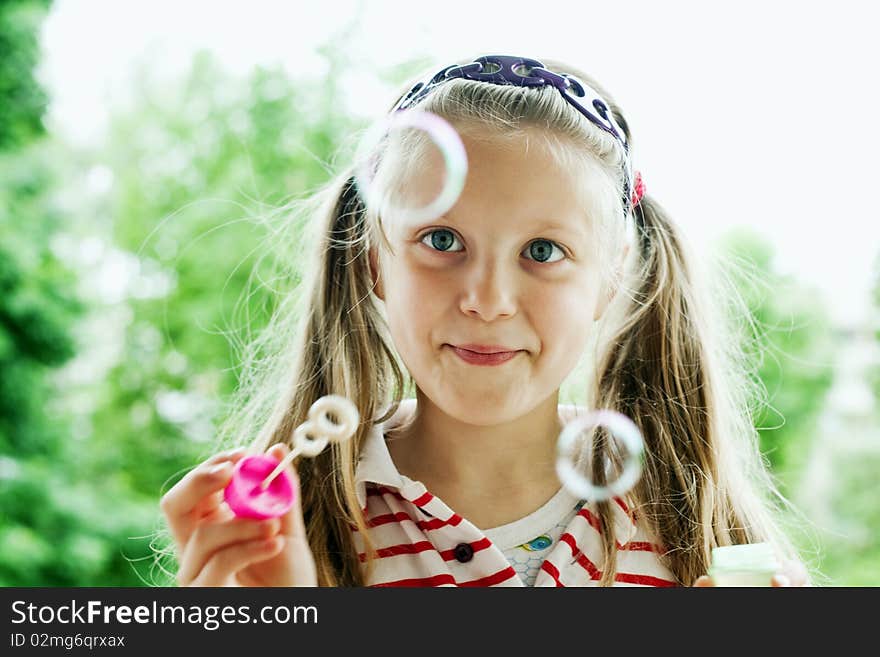 An image of a nice girl with bubbles. An image of a nice girl with bubbles