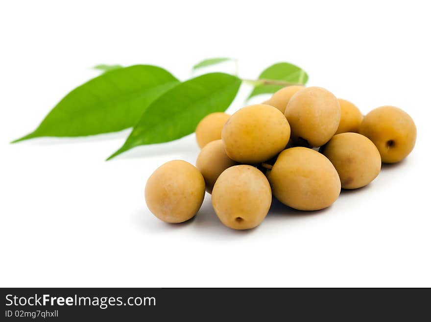 An image of green olives on the table