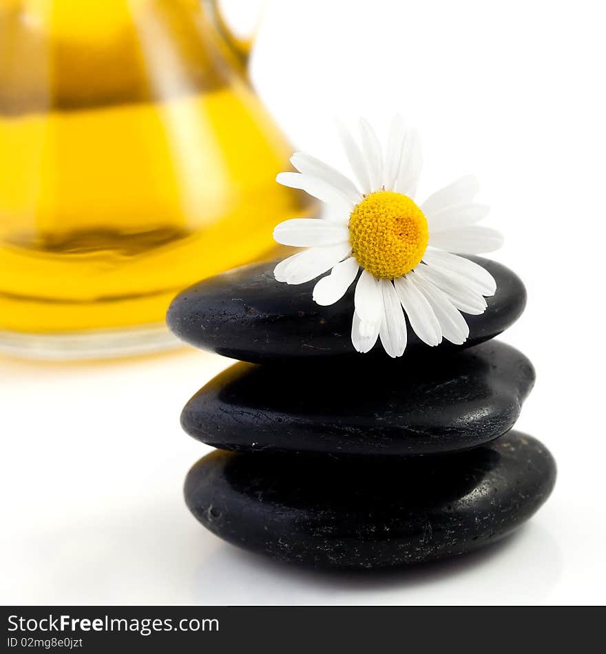 An image of a heap of black stones for spa massage