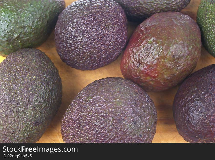 Whole avocado black skin variety on board