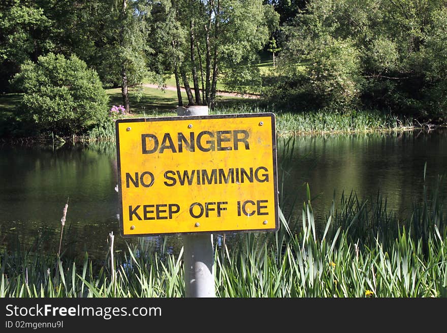 No swimming warning sign