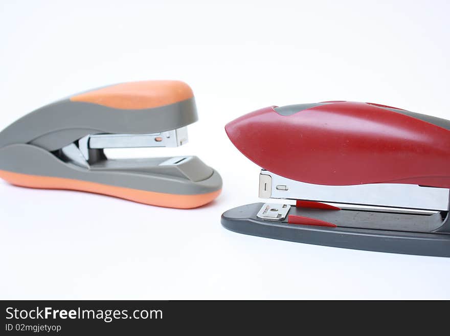 Two staplers for papers of a various configuration