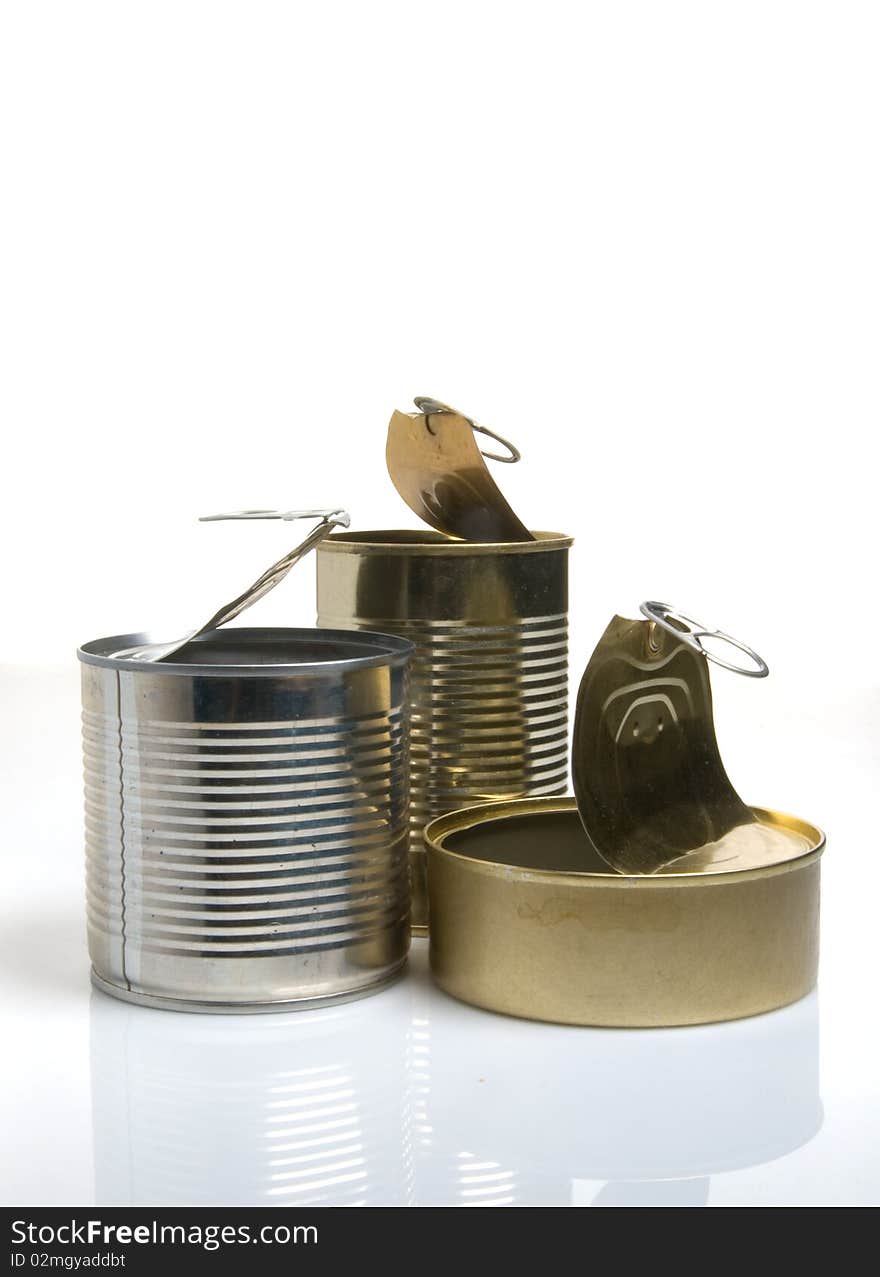 Three open empty tins on white background. Three open empty tins on white background