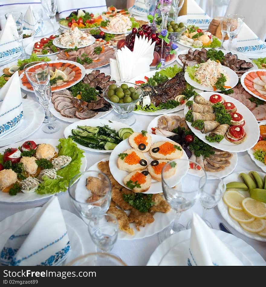 An image of many various dishes on the table