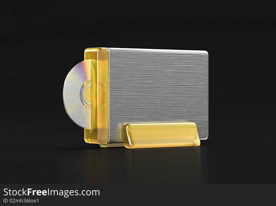 DVD metal and transparent plastic standing drive, on dark background. DVD metal and transparent plastic standing drive, on dark background.