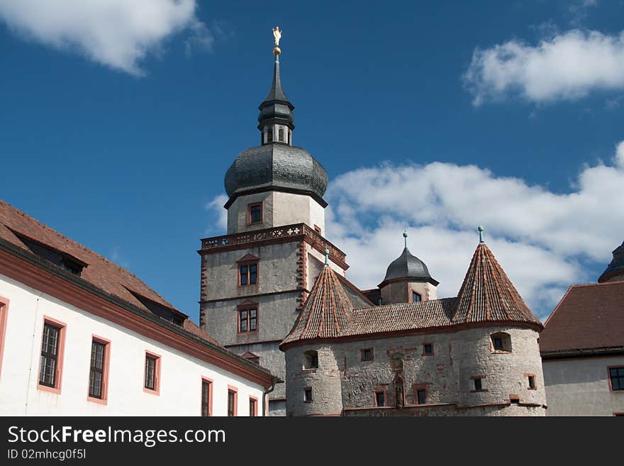 Detail shot of of the buildings inside a castle in Wuerzburg, Germany, showing remnants of how people used to live in the middle ages. Detail shot of of the buildings inside a castle in Wuerzburg, Germany, showing remnants of how people used to live in the middle ages.