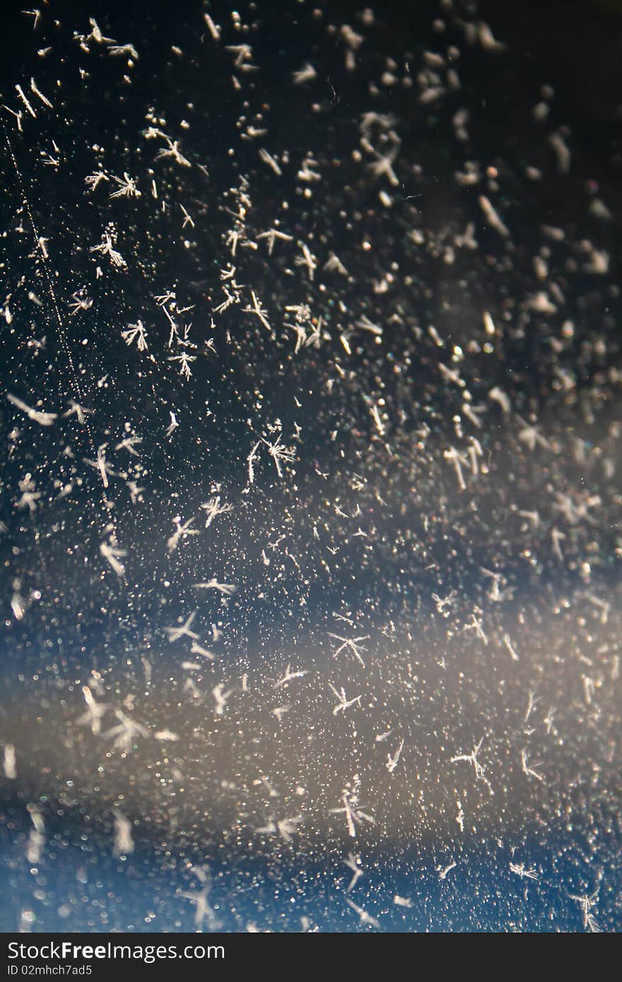 Ice crystals in front of a cloudscape high up in the sky. Ice crystals in front of a cloudscape high up in the sky