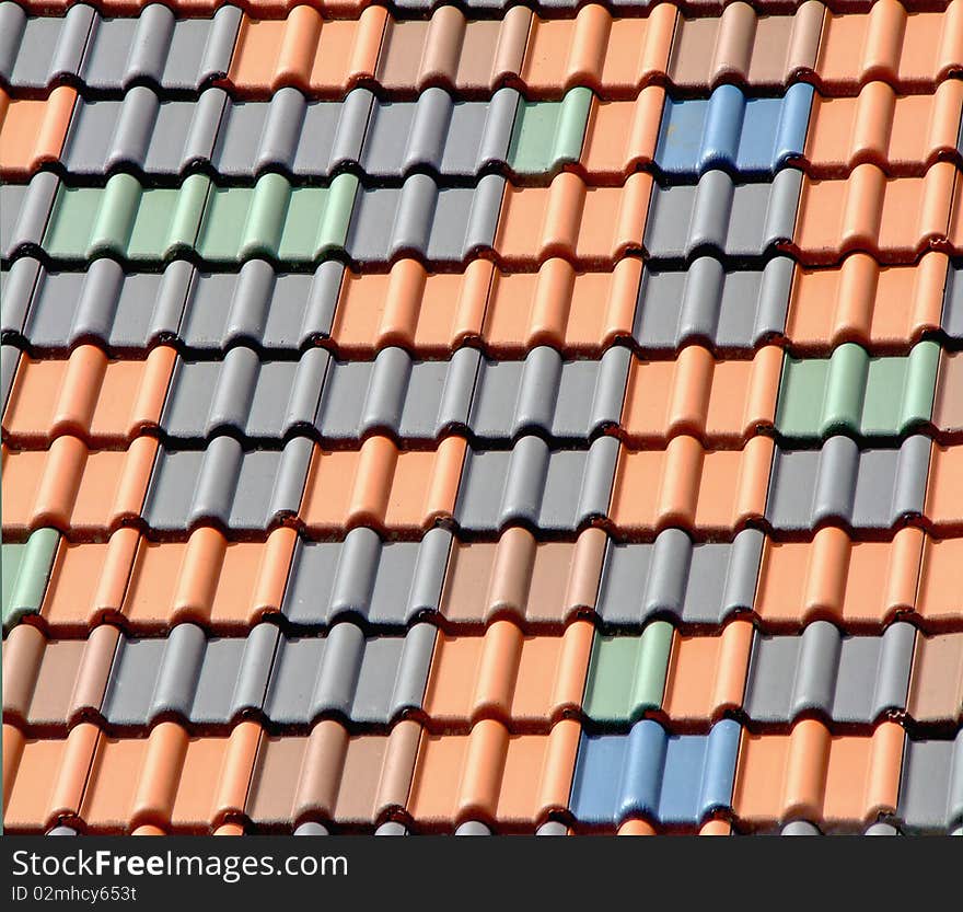 Multi-colored tiles on the roof.