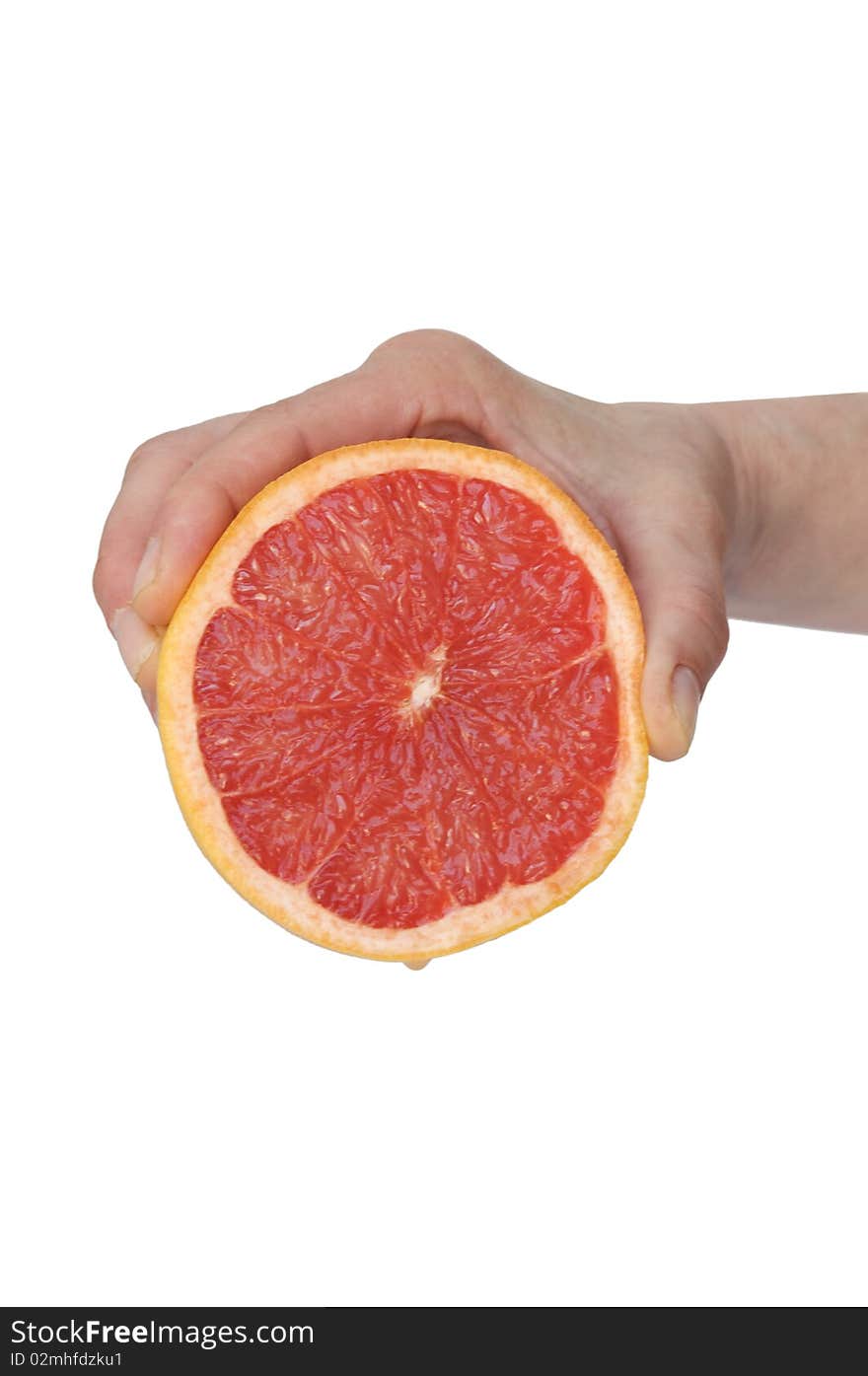 Hand Squeezing An Orange