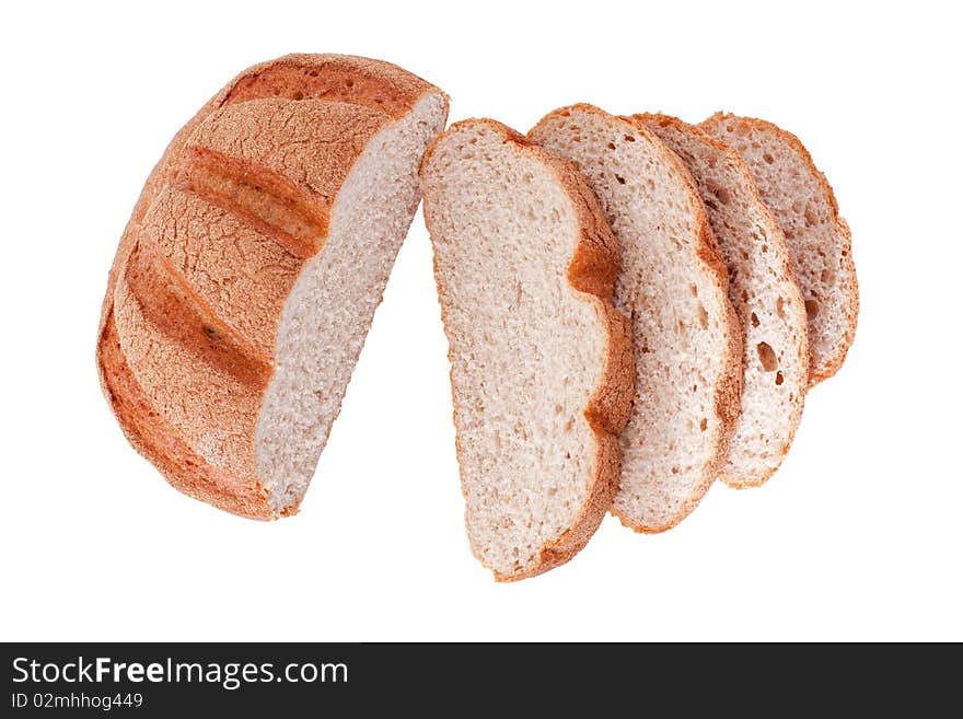 Sliced homemade brown bread, isolated on white