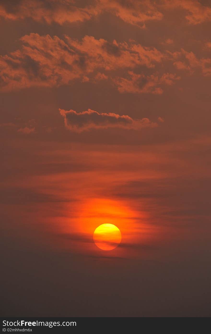 Tropical sunset on the sky.