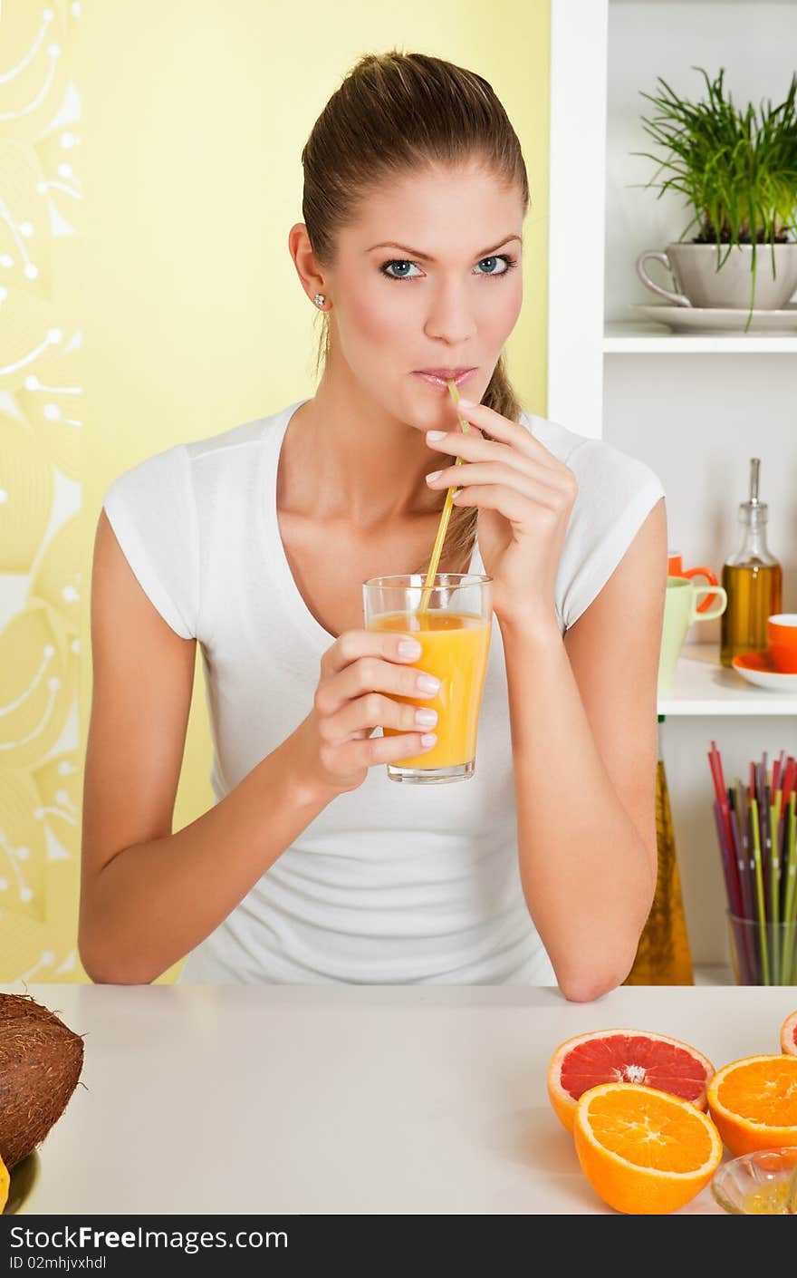 Beauty, young girl drinking orange juice at home